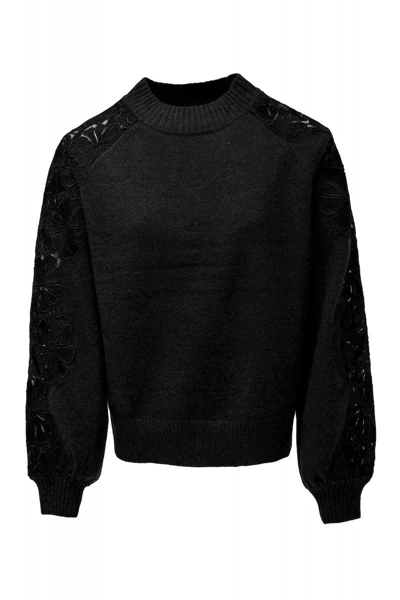 Pull femme en maille et broderie